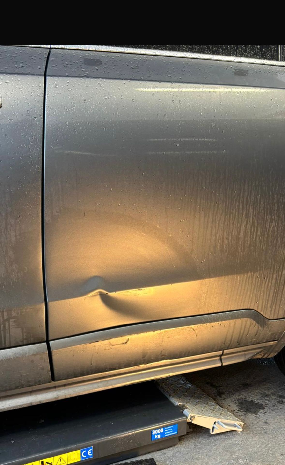 Before repair - Side Panel Repair